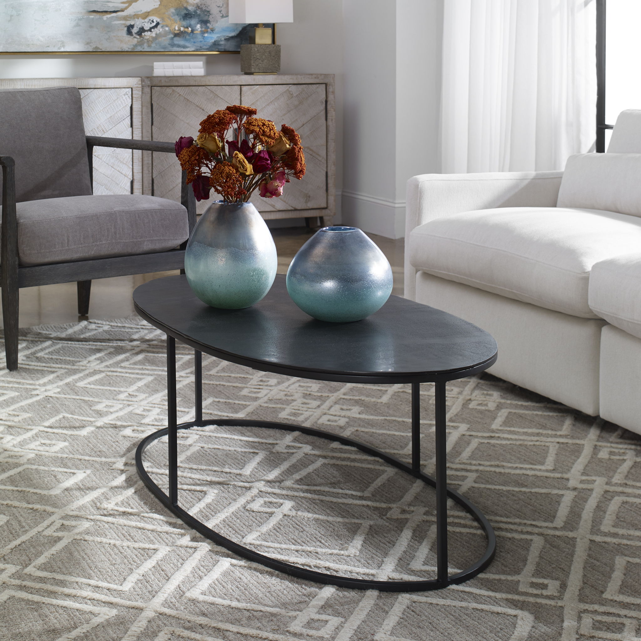 Coreene - Oval Coffee Table - Black